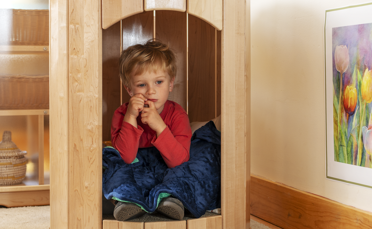 A young boy in a Calm Nest