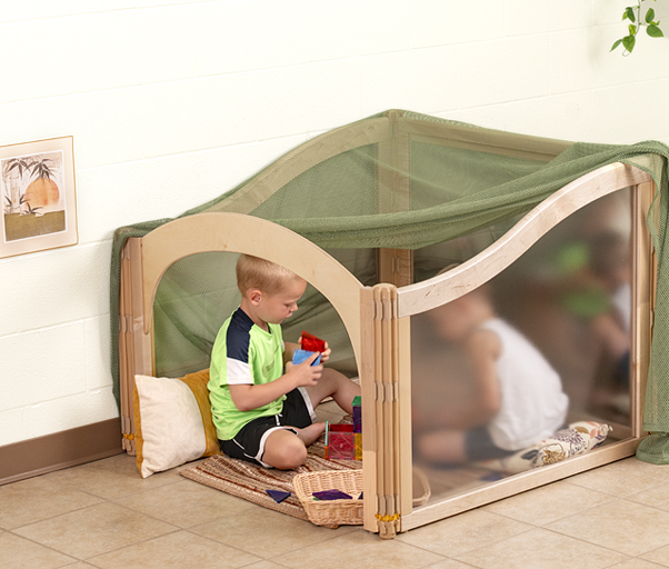 Children in a Community Playthings Listening Cube.