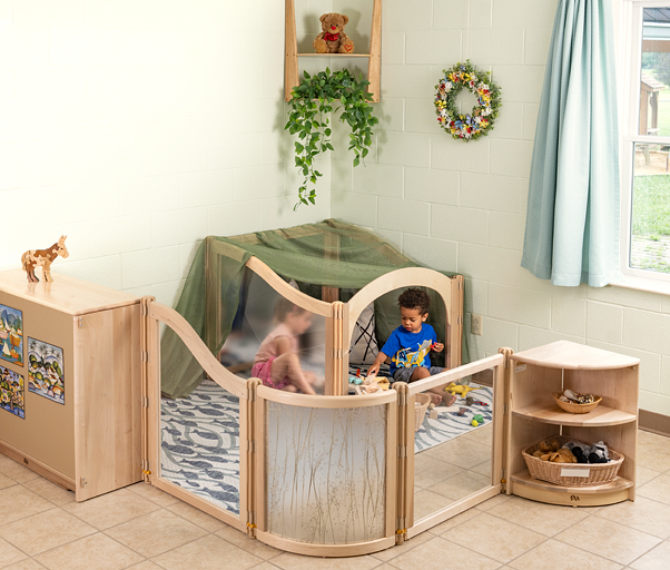 A Listening Cube surrounded by a divider made of Community Playthings Roomscape Panels