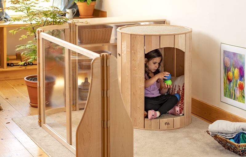 A child playing in a Calm Nest