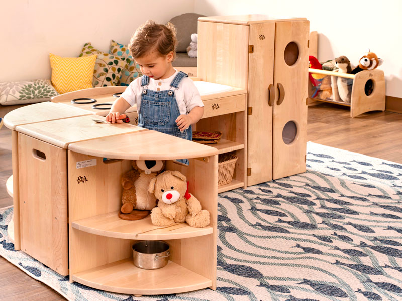 Child playing with Toddler Kitchen 