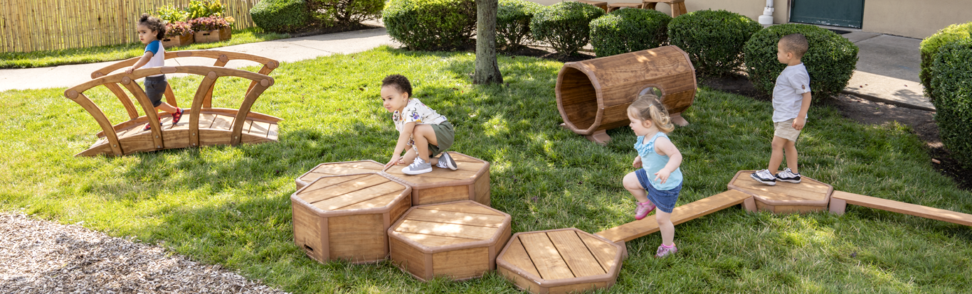 Children playing on Outlast risers